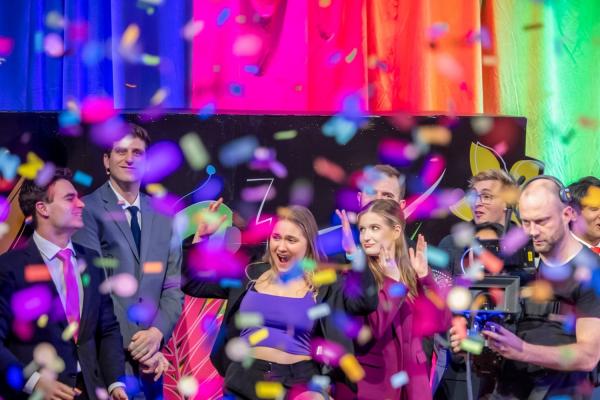 2.009 students celebrate as a shower of confetti marks a well-deserved end to their product design semester. Left to right: Anthony Altala, 2.009 instructor Rob Mercurio, Ariel Mobius, Emma Higgason, Brandon Lenning, and 2.009 staff Matthew Dorris 